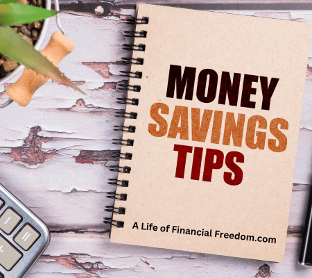 Money Savings Tips notebook on table