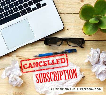 laptop with words below it that say Cancelled Subscription in red