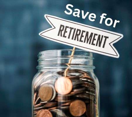 A glass jar full of coins with a sign save for retirement.